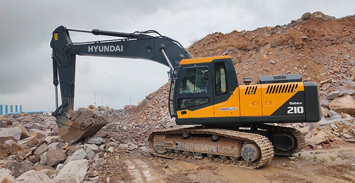 Kasturi Earthmovers, top earthmovers contractor in Pune, earthmoving services, land development, demolition services, mining solutions, infrastructure development, long boom excavators, hydraulic rock breakers.