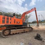 Rent TATA 470 long boom excavator for deep excavation, desilting, and mining in Pune, Mumbai, Ahmedabad, Hyderabad, and other top cities across India.